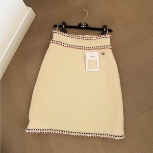 Authentic Chanel Elegant Cream Pencil Skirt with Red and Black Details